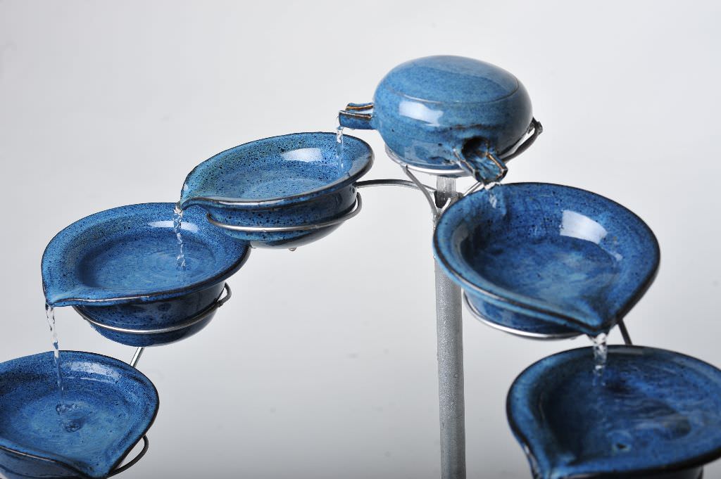 Blue ceramic fountain detail shot