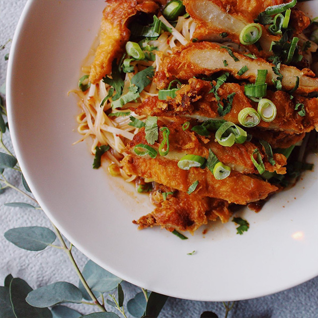 A plate of Thai crispy chicken shot top down