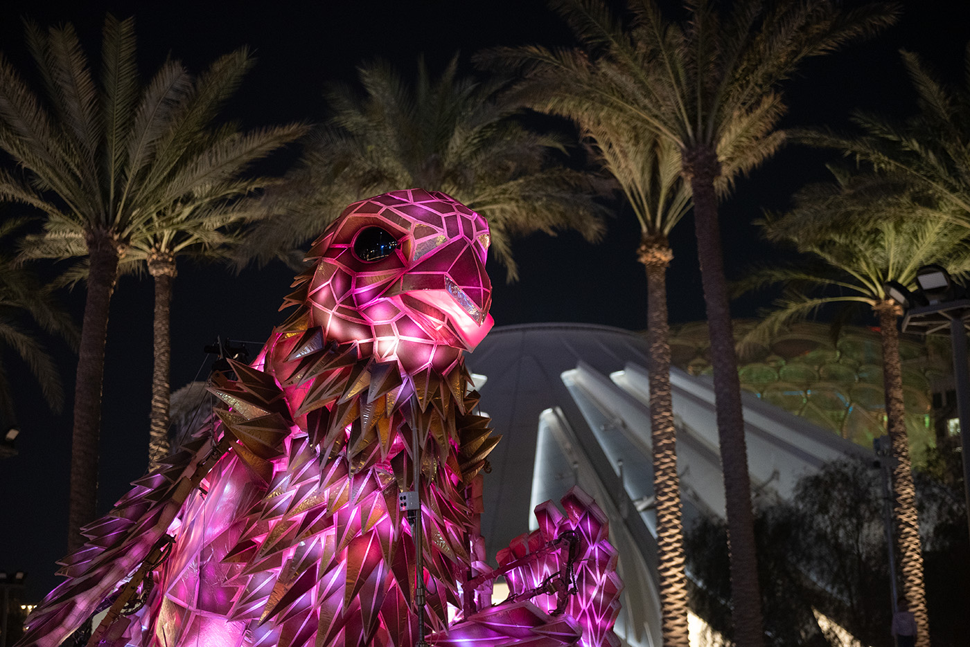 Glowing faceted pink bird sculpture