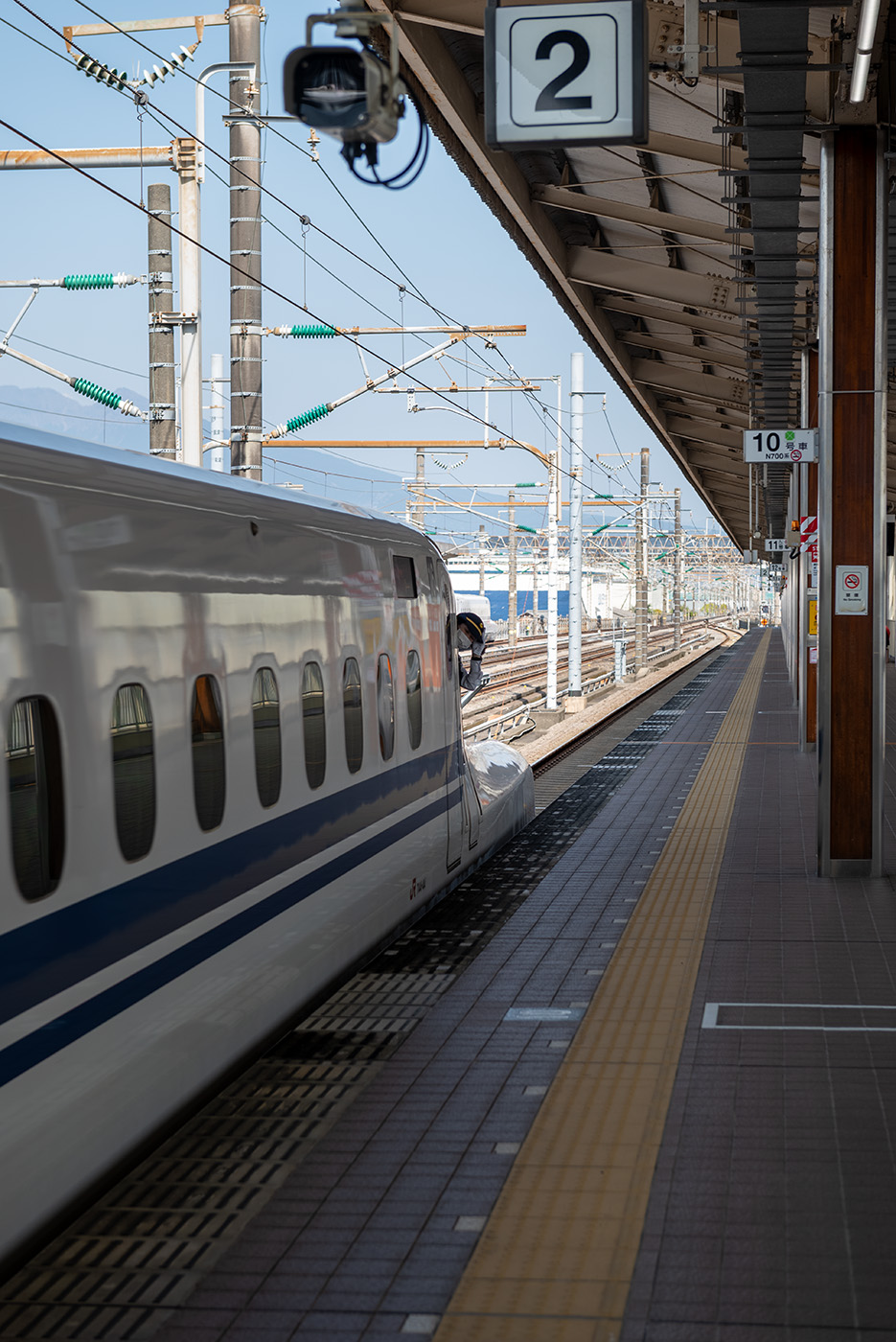 Train conductor looking out of the train