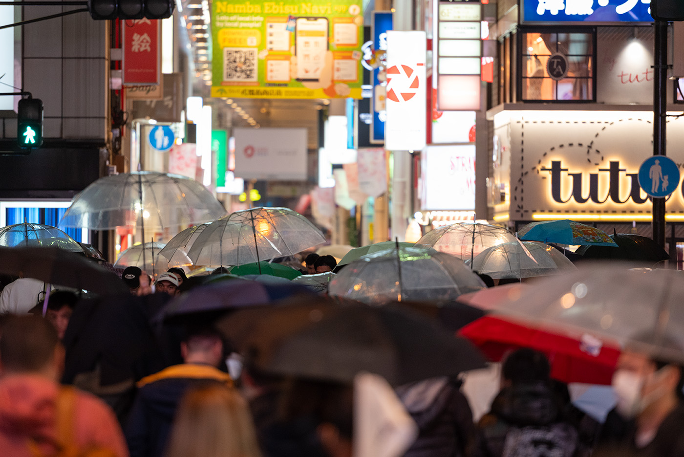 A crowd of umbrellas on a rainy day