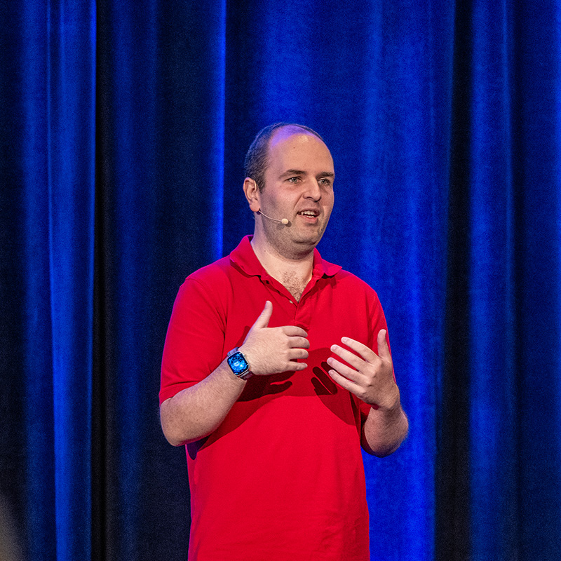 An action shot of me speaking on stage